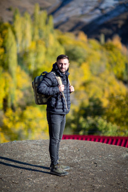 istock Man hiking in nature 1191958697