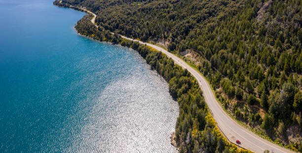 istock Bariloche road by lake, mountain range with snow, Argentina 1191958932