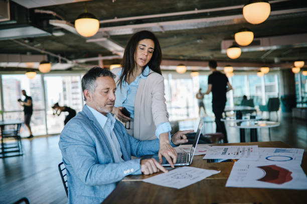 istock Colleagues working together in the Buenos Aires office 1191959520