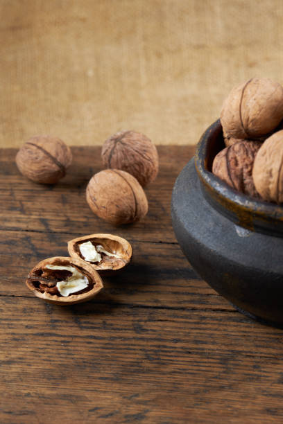 istock walnuts on a wooden background. healthy eating. 1191960118