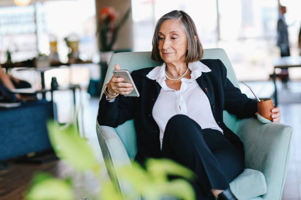 istock Senior woman drinking Yerba mate tea in the office 1191965794
