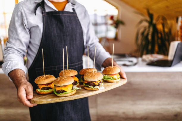 istock Delicious slider-burgers ready to be served on table 1191966086