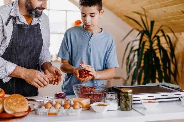 Dinner preparation of father and son