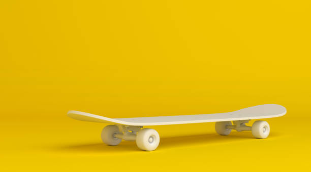 istock White skateboard on bright yellow background in pastel colors 1191971471