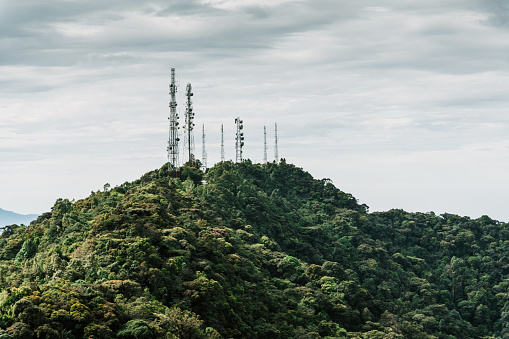 The peak of Gunung Brinchang with masts for cellular network transmitters.