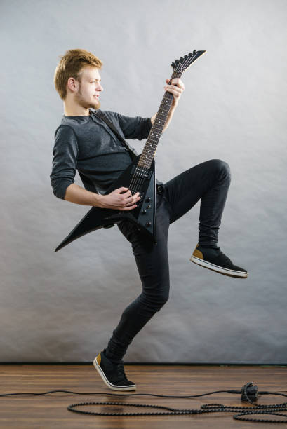 istock Man playing on electric guitar 1191975416