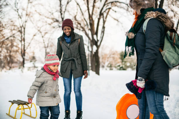 istock Family have fun at snow 1191980907