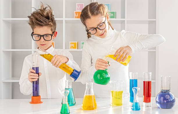 istock Little scientists conducting chemical experiments 1191982785