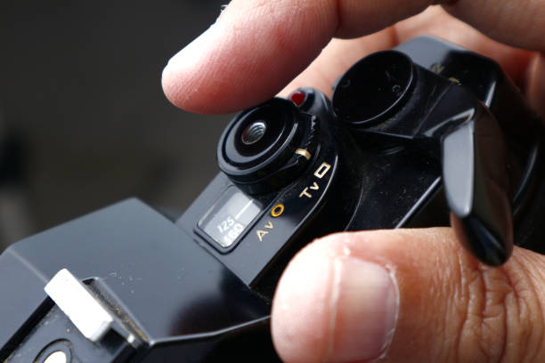 istock Shutter button of an old film camera 1191983268