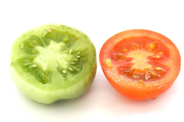 istock Red and green tomatoe slices 119198764