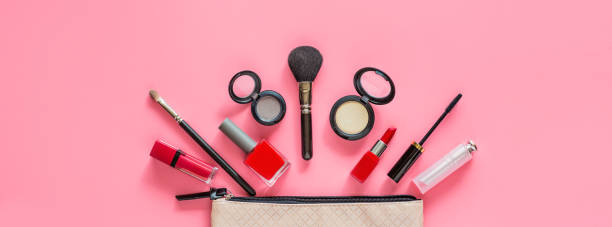 istock Make up items on pink color background. Horizontal web banner. Set of luxury decorative cosmetics flat lay, top view, mockup, template. Minimal style. Beauty blogger concept 1191990133