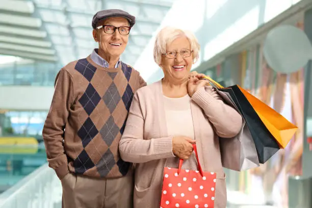 Senior couple shopping at a shopping center