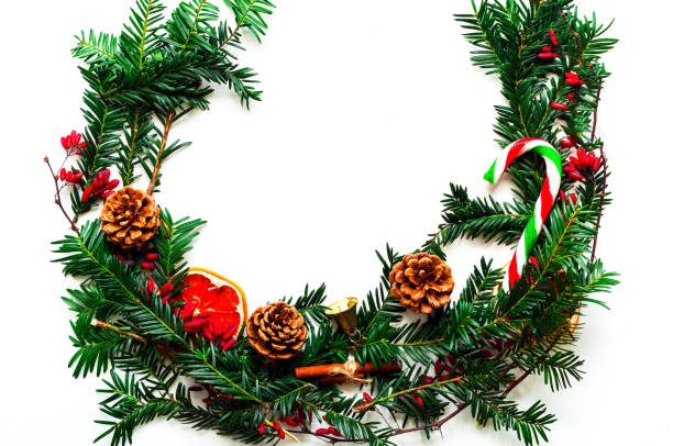 istock Christmas wreath on white isolated background. Festive background for decoration or projects. Copy space 1191991173