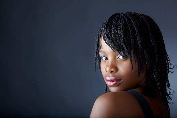 African woman smiling and posing stock photo