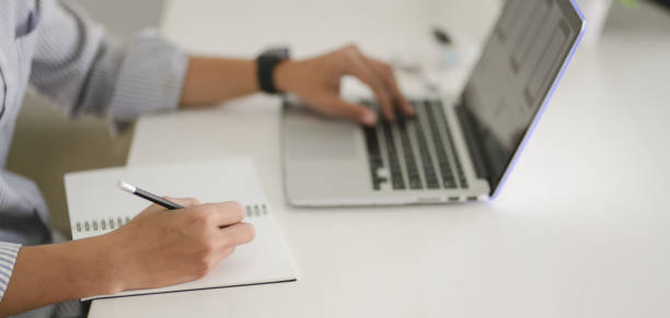 istock Cropped shot of young professional UX web developer team working on their project 1191996498