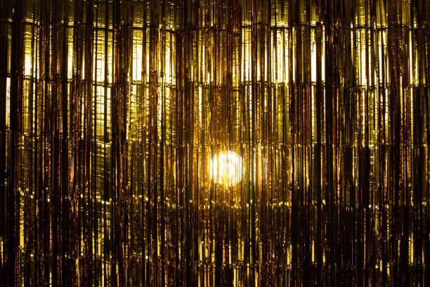 istock Gold Foil strip Curtain hanging on wall studio 1191996807