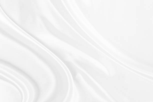 istock White gray satin texture that is white silver fabric silk background with beautiful soft blur pattern natural. 1191997736