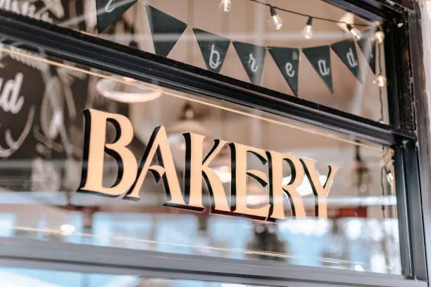 'Bakery' text on shop-window in Granville island public market, Vancouver