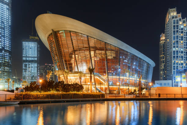 Awesome night view of Dubai Opera House at downtown, UAE stock photo
