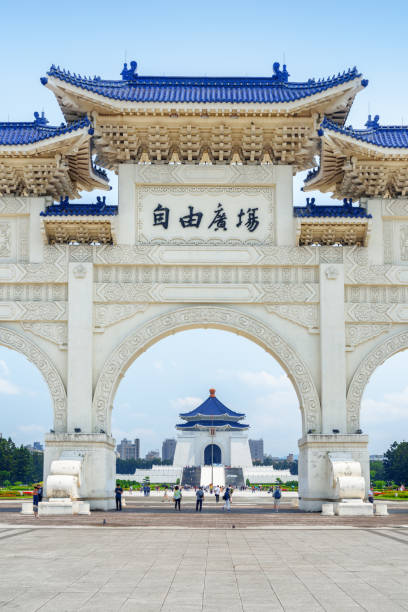 Unusual view of the National Chiang Kai-shek Memorial Hall Unusual view of the National Chiang Kai-shek Memorial Hall through the Gate of Great Piety at Liberty Square in Taipei, Taiwan. The memorial hall is a popular tourist destination of Asia. chiang kai shek photos stock pictures, royalty-free photos & images