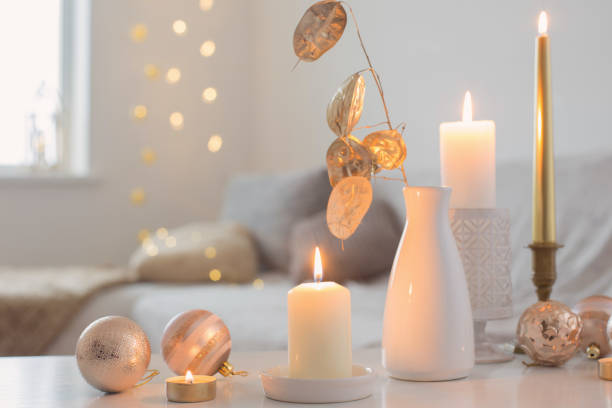 istock Christmas decorations with candles at home 1192007849