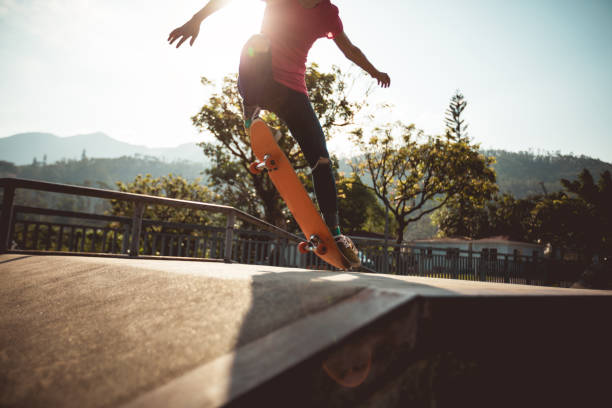 istock Skateboarder skateboarding on skate park 1192011091