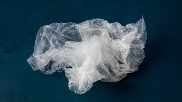istock plastic bag on a dark blue background. The concept of ecology 1192016143