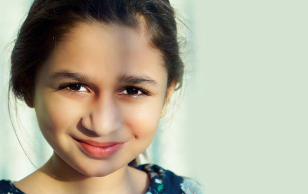 asian/indian beautiful girl of portrait 11, 12 years old. child with perfect white smile - 10 11 years child human face female imagens e fotografias de stock