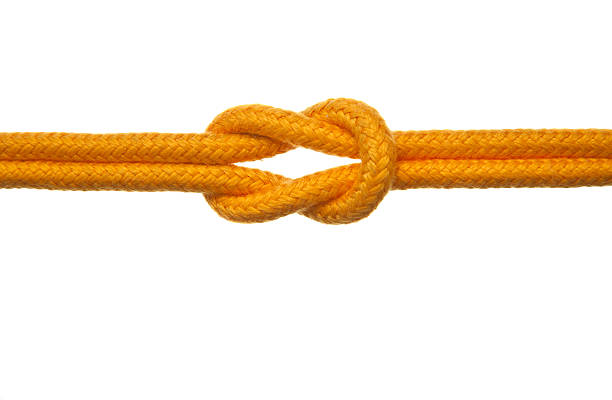 żółty liny z węzeł prosty - tied knot rope reef knot isolated zdjęcia i obrazy z banku zdjęć