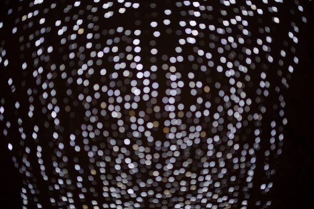 istock Texture of Christmas lights garlands in blur. 1192019811