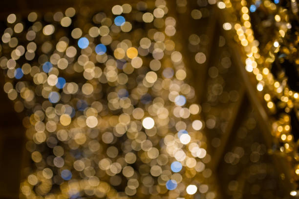 istock Texture of Christmas lights garlands in blur. 1192019842