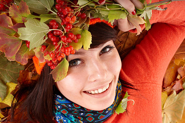 istock Girl holding autumn orange bunch. 119202056