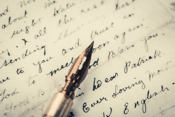 istock fountain pen on paper with ink text closeup 1192023328
