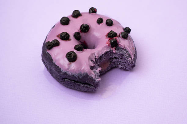istock close up of donut on blue background 1192023448