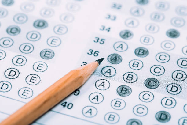 istock Fill in the answer sheet in the exam with a pencil 1192023450