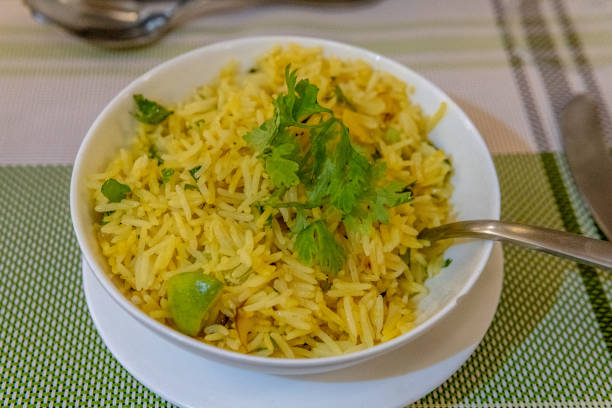 istock Yellow saffron rice with green garnish 1192024181