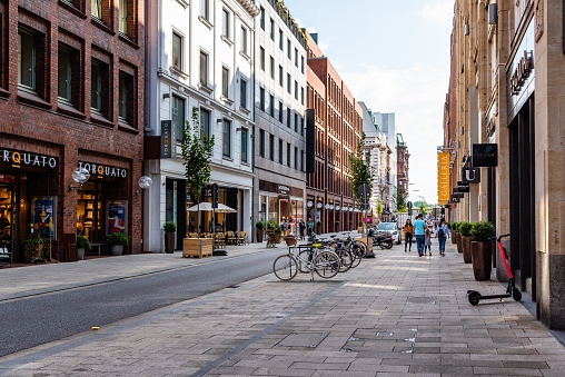 Hamburg, Germany - August 3, 2019: Scenic view of street with luxury fashion stores