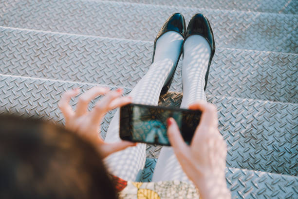 istock Woman holding a smartphone. 1192037802
