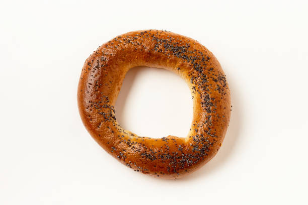 istock bagel with poppy seeds on a white background 1192051029