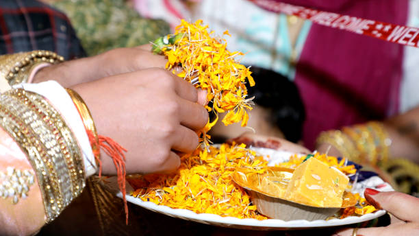istock Indian bridesmaid wedding baraat welcome ritual ceremony 1192051937