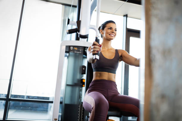 istock Attractive young woman working out at a gym. 1192054429