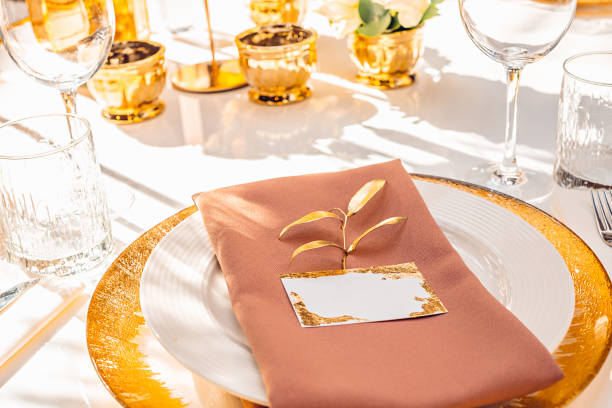 istock Wedding table setting with a nameplate in gold color 1192054751