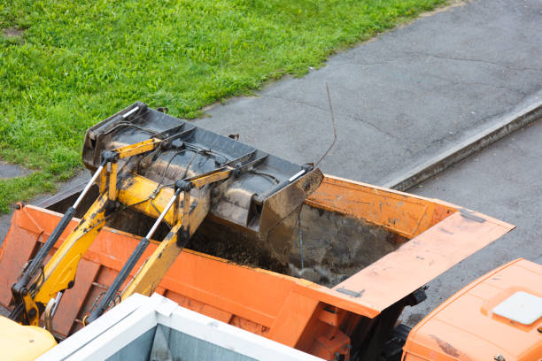 istock Loading construction debris into the truck for removal to the landfill. 1192055747