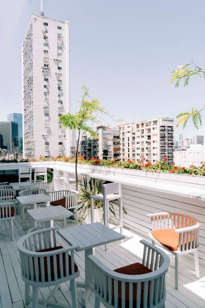 istock Chairs and tables arranged in balcony of hotel 1192055837