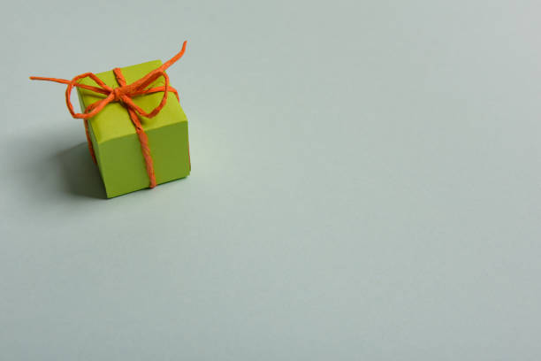 istock christmas presents nicely decorated with bows and feathers. view from above. 1192060456