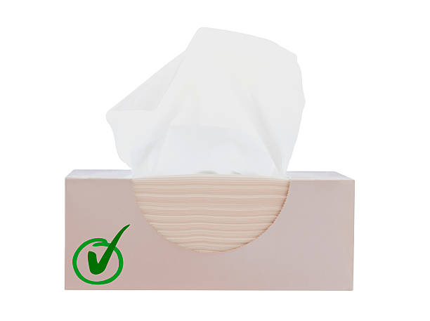 White paper box of tissues with green tick and circle isolated on white background with clipping path, horizontal composition