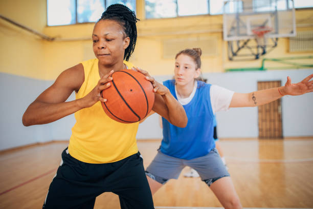 istock Two women in basketball duel 1192065727