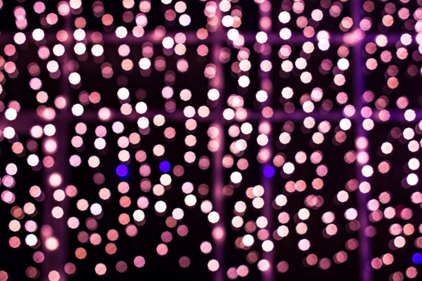istock abstract blurred of multi-colored glittering shine 1192067302