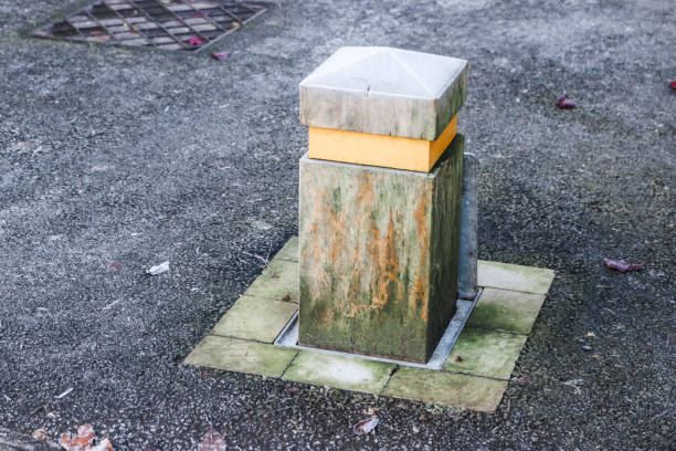 istock Concrete bollard on the road 1192067626