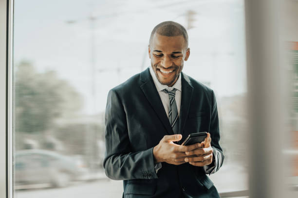 istock Businessman using cellphone on the tram 1192068523